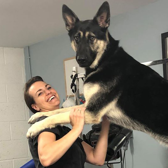 Helen hugging big dog